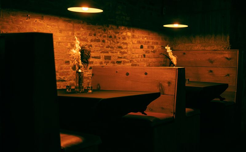 Cozy booth seating inside Pizza luce Duluth restaurant